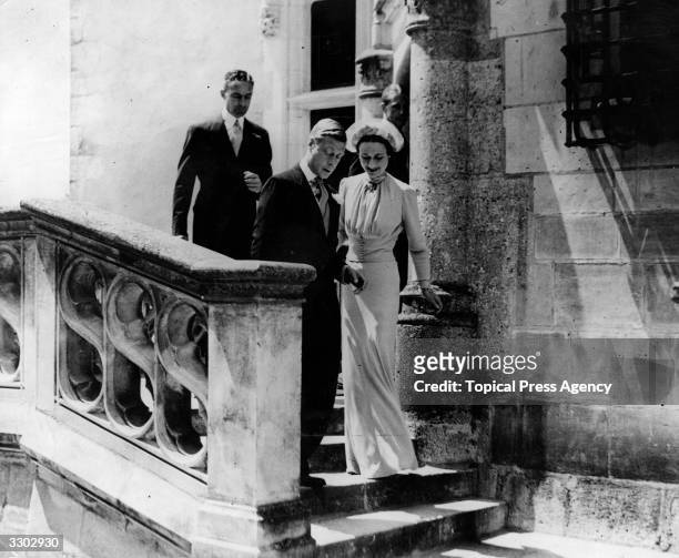 The wedding of the Duke and Duchess of Windsor at the Château de Candé, Tours, France, 3rd June 1937. Behind them is Major Metcalfe, the Duke's best...