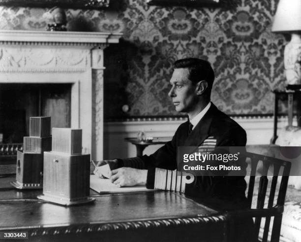 King George VI addresses the people of Britain and the British Empire live over BBC news radio networks at 6pm on Sunday 3rd September 1939, the day...