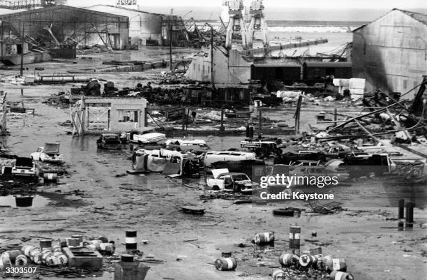 Mass of burned out vehicles in the harbour area of Beirut after the civil war.