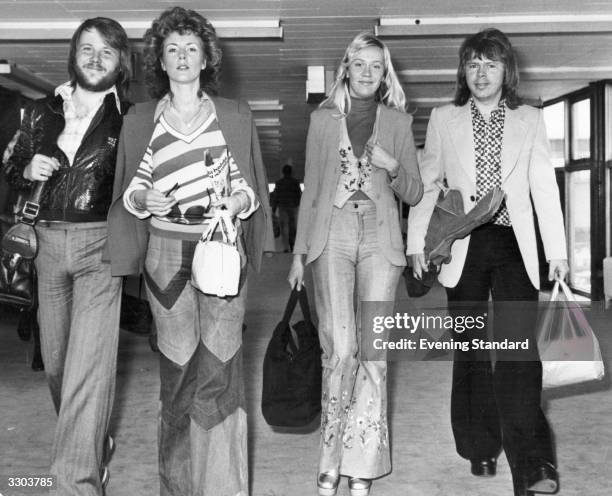 Swedish pop group Abba arriving at London Airport.