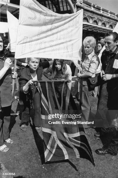 Racist demonstration at Smithfield, London. Their banner reads - 'Stop The Asian Invasion'.