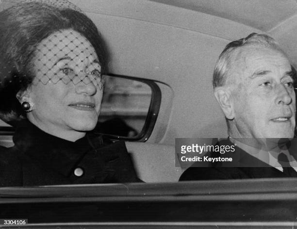 The Duchess of Windsor with Earl Mountbatten en route to Buckingham Palace where she will stay during her trip to England to attend her late...