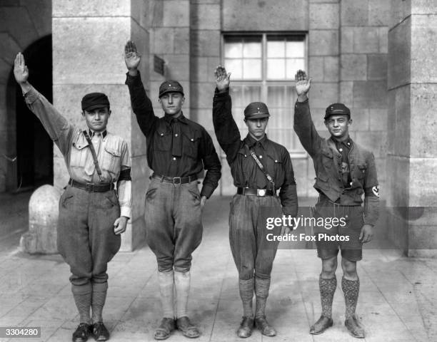 Uniformed members of Hitler's National Socialist party giving the Nazi salute at Munich.