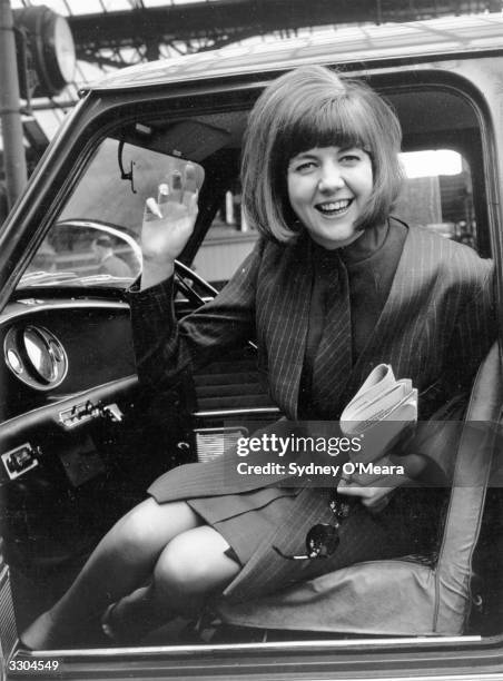 Pop singer Cilla Black in her mini.