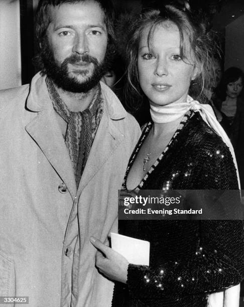 British blues-rock guitarist Eric Clapton and his girlfriend fashion model Patti Boyd, ex-wife of ex-Beatle George Harrison, pictured at the premiere...