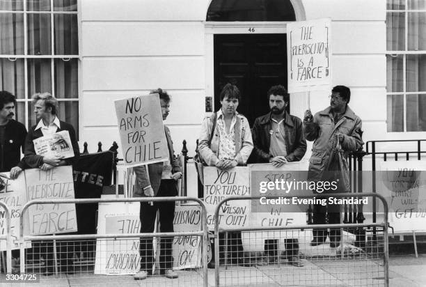 Demonstrators outside the Chilean Embassy, Devonshire Street, London. The placards read; 'Stop Fascism In Chile'.