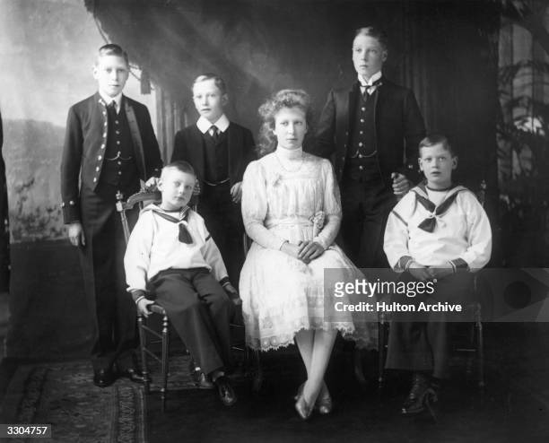 In the centre is the Countess of Harewood, Mary, Princess Royal, , with her five brothers, including the Duke of Windsor, King Edward VIII, , then...