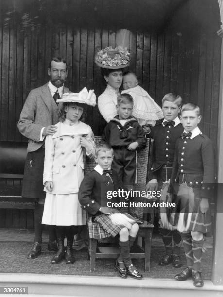 Royal family group during a visit to Abergeldie, circa 1906. From back, left: the Prince of Wales , Mary, Princess Royal , the Princess of Wales...
