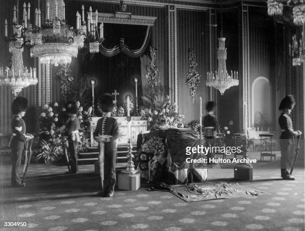 The draped coffin of King Edward VII, , who ascended the British throne in 1901, lies in state in Buckingham Palace, London. He was succeeded by his...