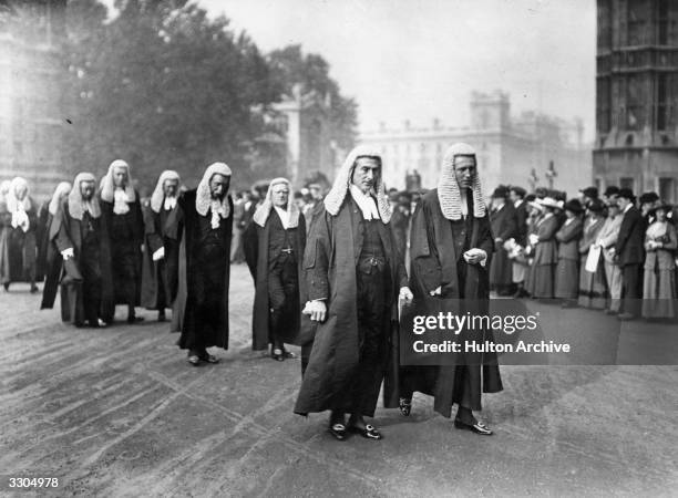 The English lawyer and statesman Rufus Daniel Isaacs, , appointed Lord chief justice in 1913, leads the procession of King's Counsels with Sir John...