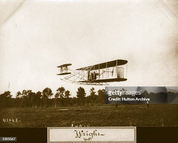 The Wright Flyer II biplane in flight. Aeroplane Album - Vol 2 Page 59