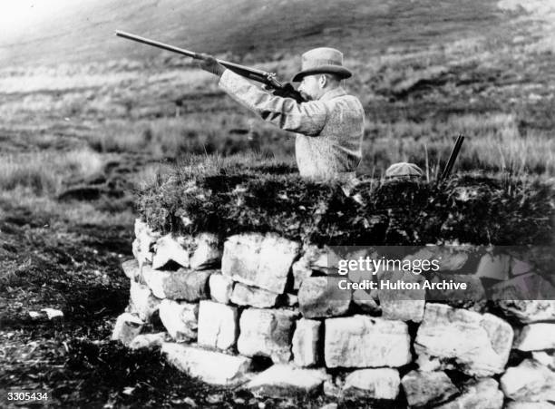King George V enjoys some shooting at Balmoral, beside the River Dee in Aberdeenshire. Prince Albert, husband of Queen Victoria, purchased Balmoral...