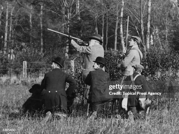 Edward VII, , who ascended the British throne in 1901 on the death of Queen Victoria, enjoys some shooting at Sandringham.