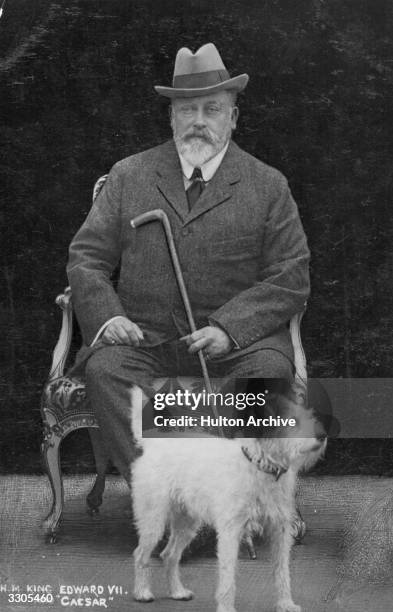 King Edward VII, , who ascended the British throne in 1901, with his favorite dog Caesar.