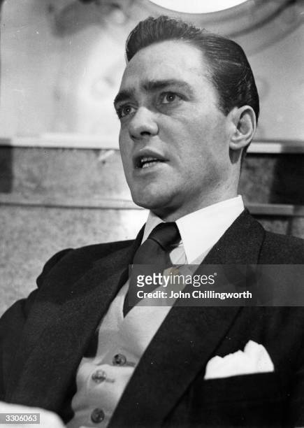 Richard Todd the British leading man who was spotted in repertory by a talent scout and is pictured on the 'Queen Elizabeth' on his way to America....