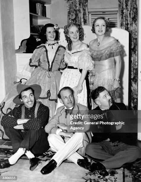 Cesar Romero , Otto Kruger , Frank McHugh in the foreground and Mrs Jack Oakie, Alice Faye and Claire Windsor all pose for a picture at Jack Oakie's...