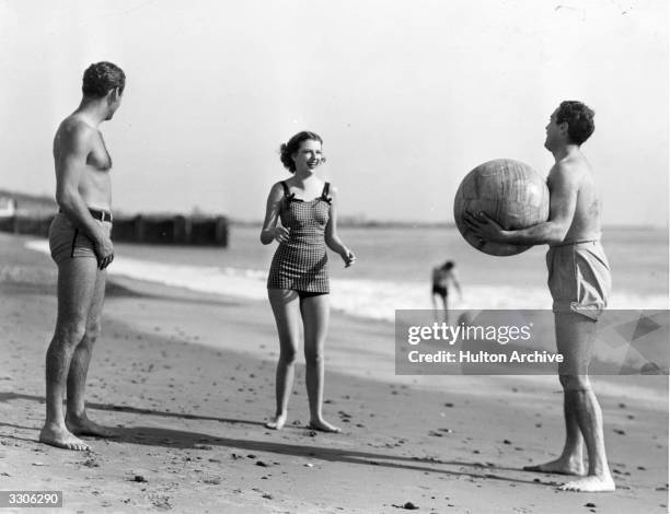 Betty Furness, the Hollywood film star and actress, signed by MGM, seen here on holiday at Santa Barbara with Pat DeCicco and Allan Jones .