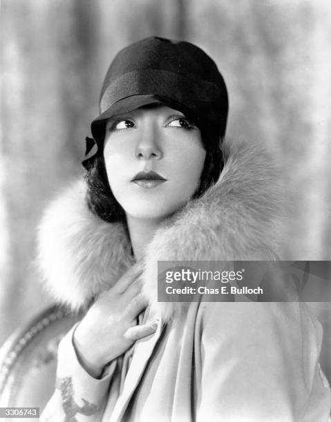 Lupe Velez, the stage name of Guadeloupe Velez de Villalobos wearing a cloche hat and a fur-trimmed coat.