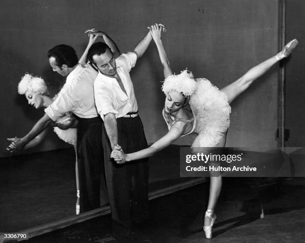 Vera Zorina, the stage name of Eva Hartwig, the ballet dancer and actress, rehearsing with her husband George Balanchine for the Warner Brothers...
