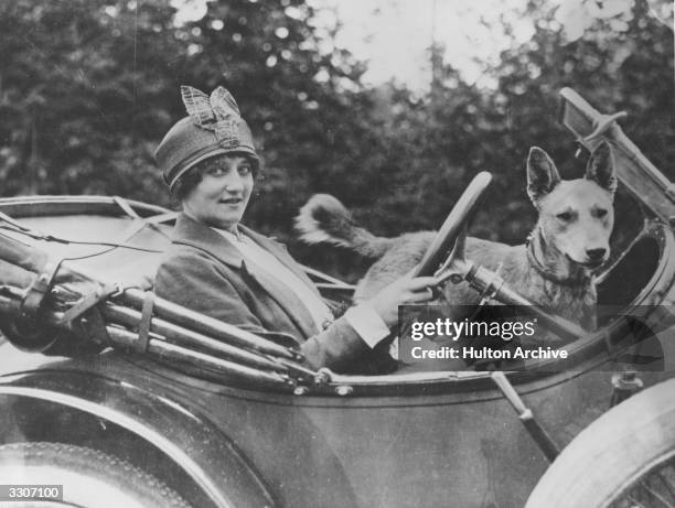 The aviator Baroness de Laroche driving her car. She was the first woman to receive a pilots licence in 1909, and was killed in an accident in July...