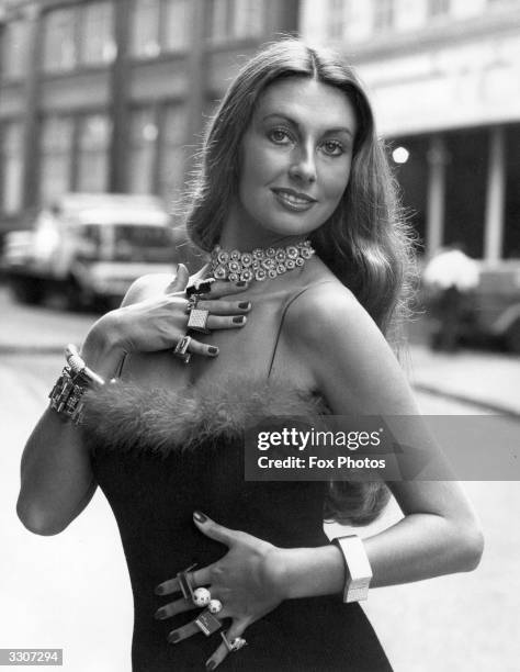 Model Marilyn Cole modelling a £50,000 necklace designed by Ernest Blyth, which won an award at the 1973 Diamond International Awards at Goldsmith's...