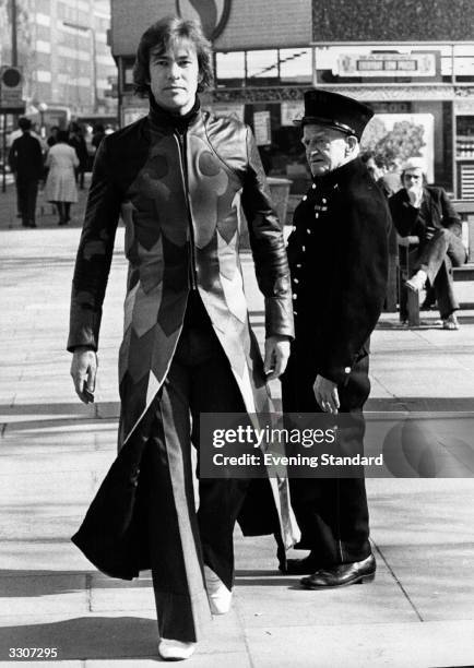 Gary Bond, who plays Joseph in 'The Amazing Technicolour Dreamcoat', wearing his coat of many colours in London's King's Road, to the surprise of...