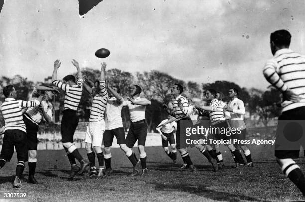 Line out is thrown in the first match of the 1908 Australian Rugby Union tour, against Devon.