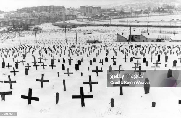 Graves of Muslims, Croats and Serbs at Zetra Stadium at Sarajevo during the siege of Sarajevo in the civil war.