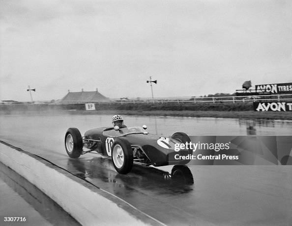 Scottish F1 Racers Scottish Formula 1 racing driver Innes Ireland practising in the rain ...
