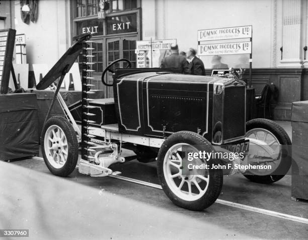 Tractor made from out-of-date cars converted for mowing , haymaking and cultivating operations on display at the Exhibition of Inventions at the...