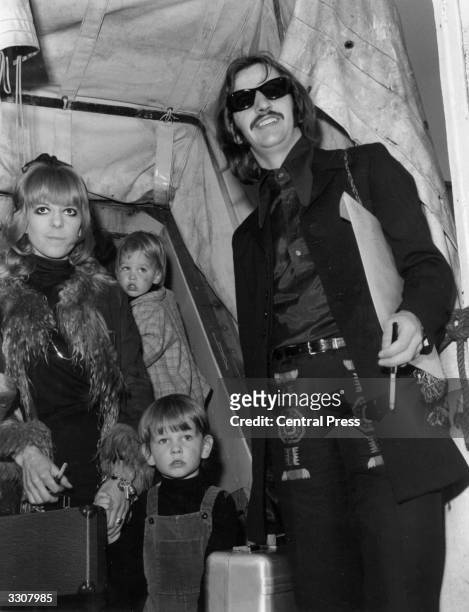 Ringo Starr, drummer with The Beatles, on board the QE2 with his wife Maureen and their two children, Zak and Jason, at Southampton, before leaving...