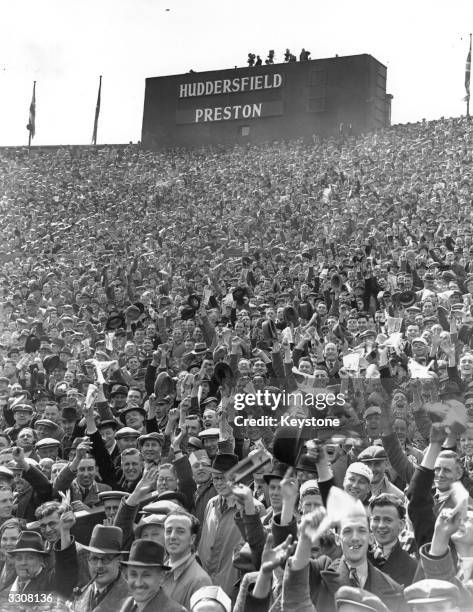 Crowds of supporters fill the stands at Wembley Stadium for the FA Cup Final between Preston North End and Huddersfield Town. Preston won 1-0 after...