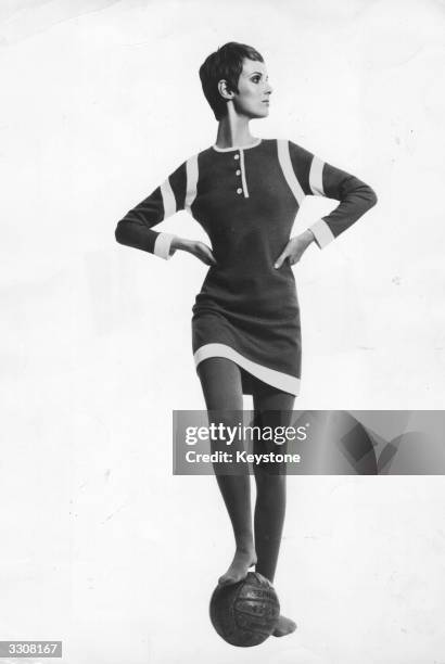 Model wearing a mini-dress in bonded wool jersey, inspired by a football strip, designed by Mary Quant's Ginger Group.