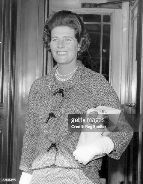 Mary Churchill arrives at the Cafe Royal, London, for an 80th birthday luncheon for Lady Churchill.