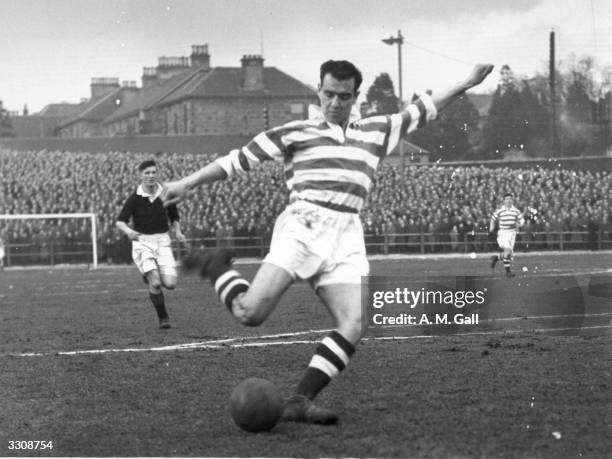 Celtic FC player Willie Fernie about to score against Falkirk during a match at Brockville Park. Fernie was a gifted inside-right who joined Celtic...