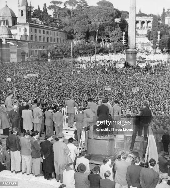 Palmiro Togliatti, leader of the Communists in Italy, addresses a large meeting in Rome.