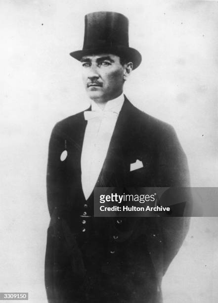 President Kemal Ataturk of Turkey , dressed in top hat and tails.