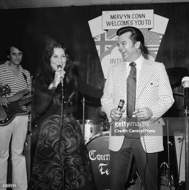 American singers Loretta Lynn and Conway Twitty performing at the fourth International Festival of Country Music, held at the Empire Pool, Wembley.