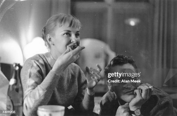 American actor Paul Newman with his wife, actress Joanne Woodward.