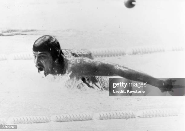 Mark Spitz, the American world champion swimmer at the Munich Olympics, breaking the record in a time of 2mins. 0.7 secs. In the 200m. Men's...