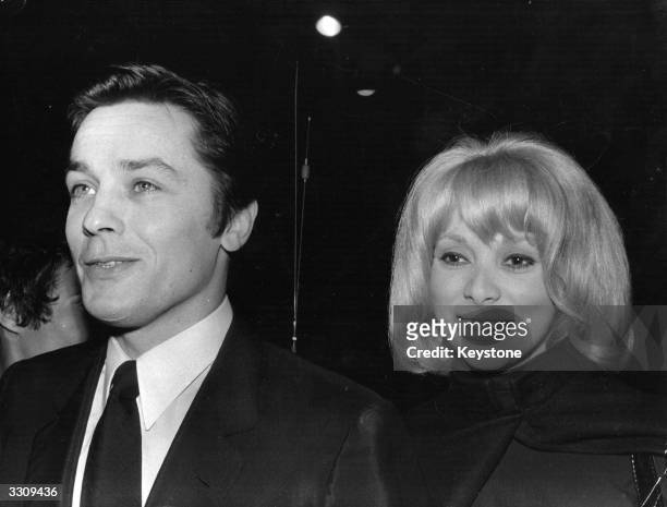 Alain Delon, the French actor and producer at the premiere of his latest film 'Borsalino,' with his partner in the film, French actress Mirielle...