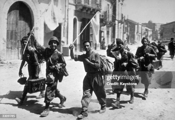 Italian soldiers surrender in Sicily to place themselves under the jurisdiction of the Allies.