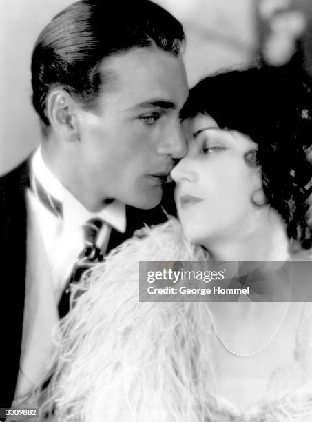 Gary Cooper , the Paramount Pictures Hollywood actor, embracing Fay Wray, star of 'King Kong'.