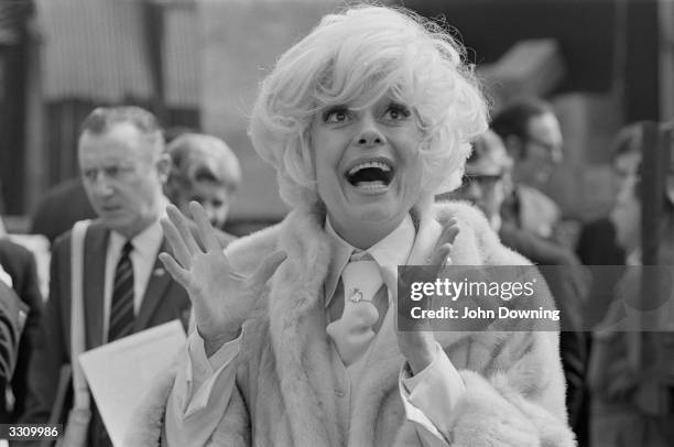 Carol Channing the American actress, arrives in London for a four-week season at London's Drury Lane Theatre.