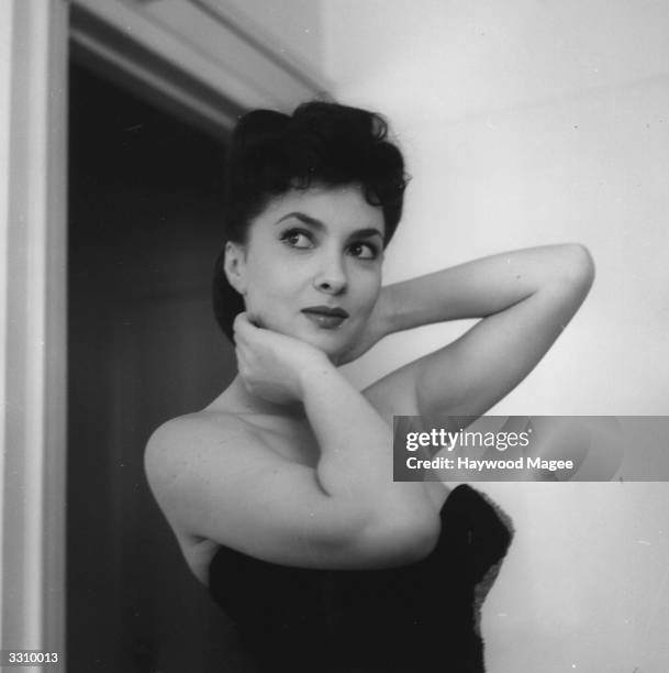 Italian actress Gina Lollobrigida in London for the first Italian film festival. Original Publication: Picture Post - 5952 - Stars Bring Fashion From...