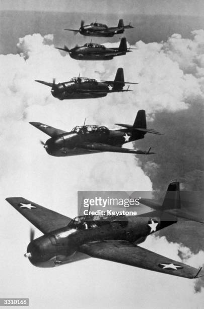 Formation of American Navy Avenger planes, the versatile torpedo-bombers that have helped rout the Japanese naval force in several battles in the...