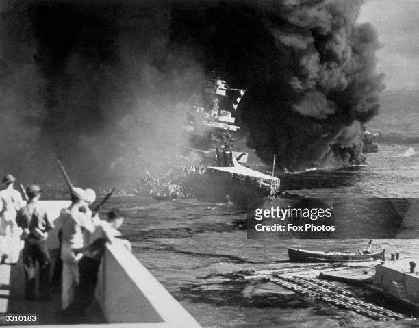 The USS California on fire in Pearl Harbour after the Japanese attack.