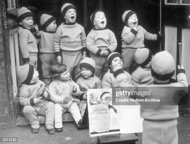 Children from the Homeless Children's Aid Society, seen here rehearsing for their Christmas party.