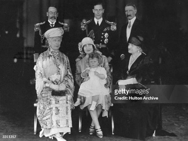 From the left: King George V and Queen Mary , the Duke of York and Duchess of York with 14 month old Princess Elizabeth and, on the extreme right,...