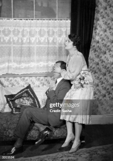Clare Higgins and William Stack in a scene from the play `Distinguished Villa', performed at the Little Theatre.